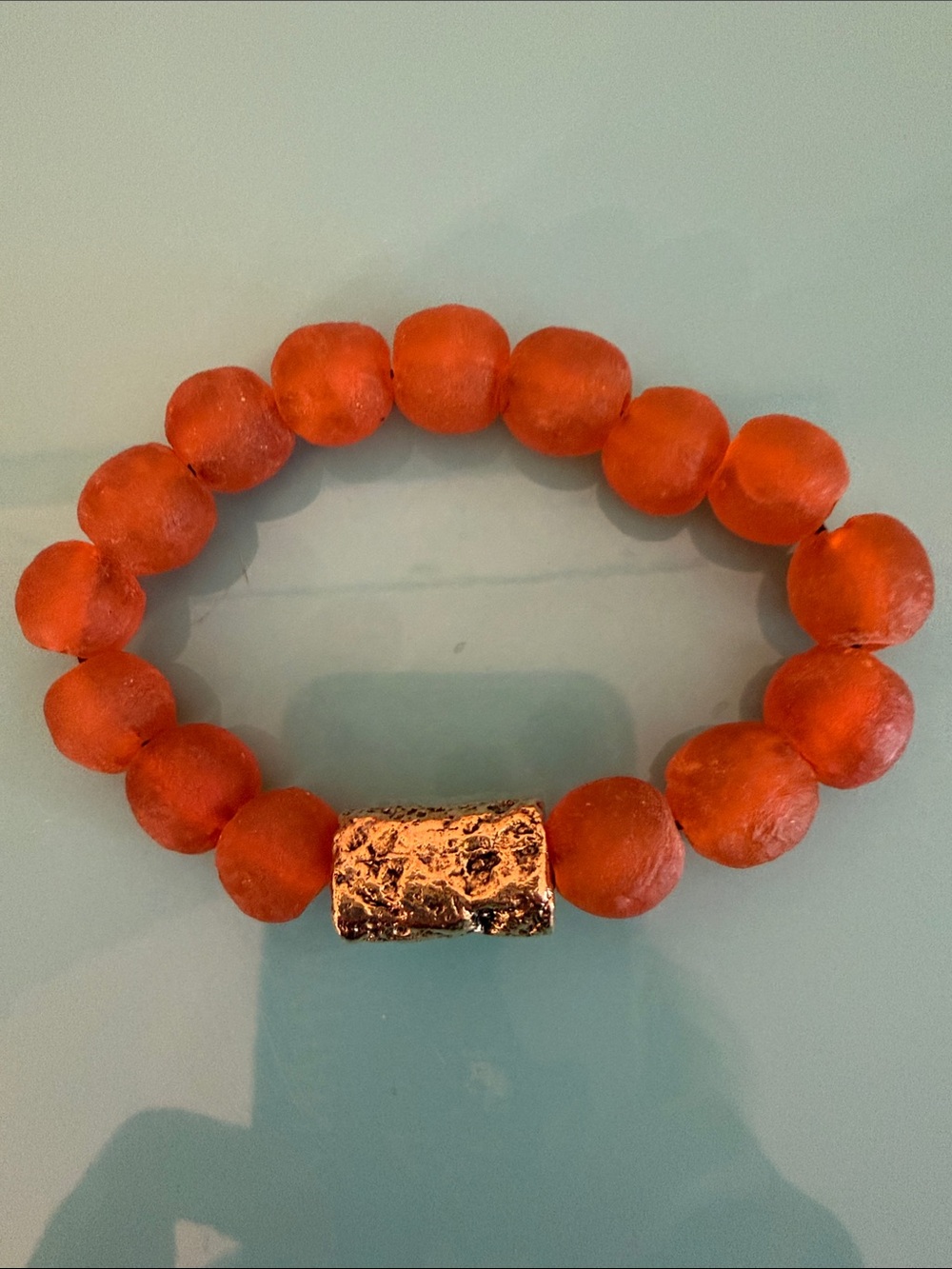 Vibrant Orange Beaded Stretch Bracelet with Textured Gold Accent